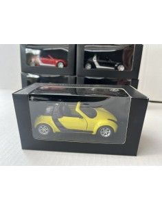 Smart roadster coupé à retrait 1:33 star shine jaune/noir SMARTWARE